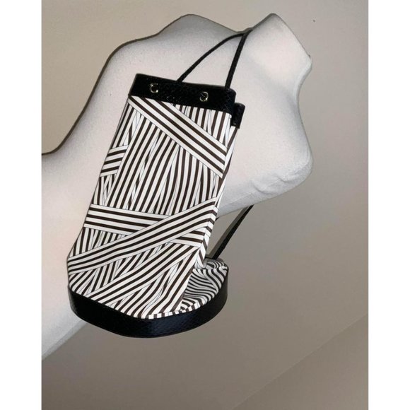 Henri Bendel Disturbed stripe Sling bag backpack New with tags